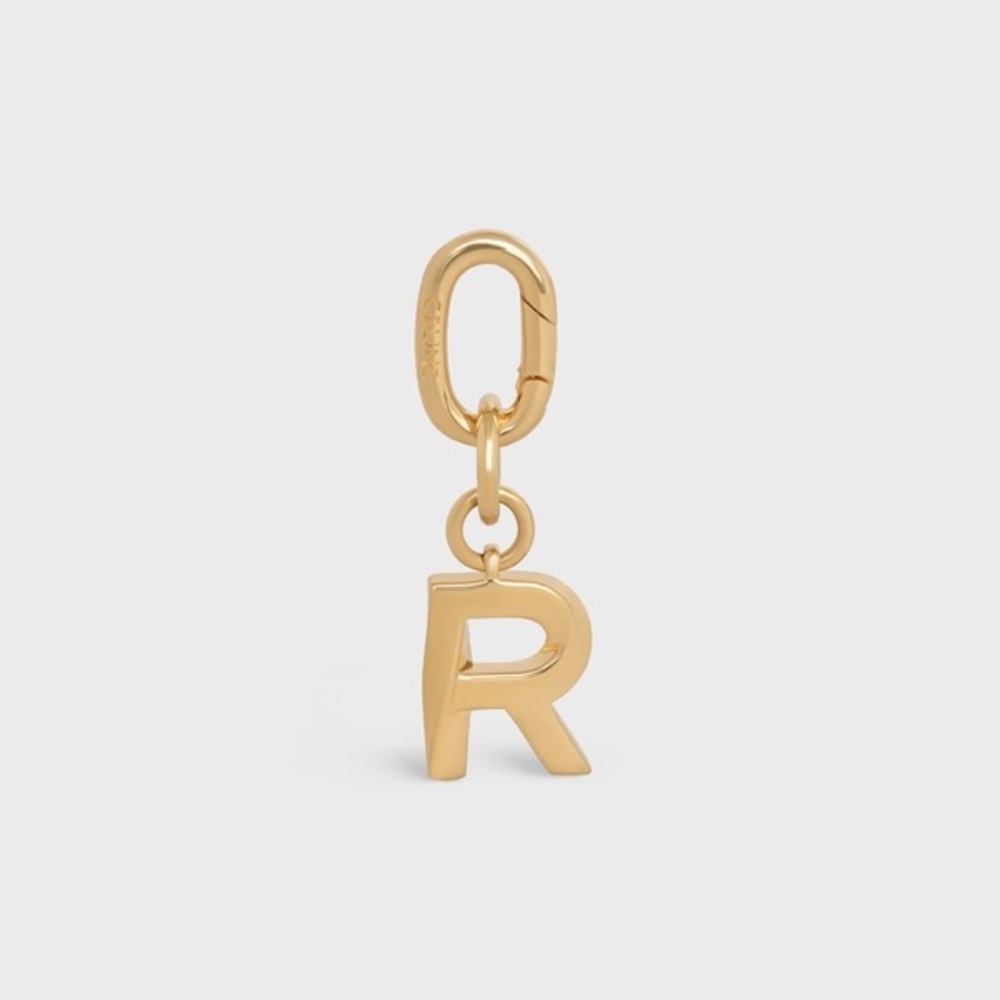 Celine R Charm in Brass - Gold
